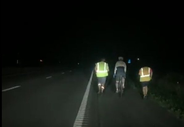 An unforgettable end to the night: two friends carrying a third without touching him